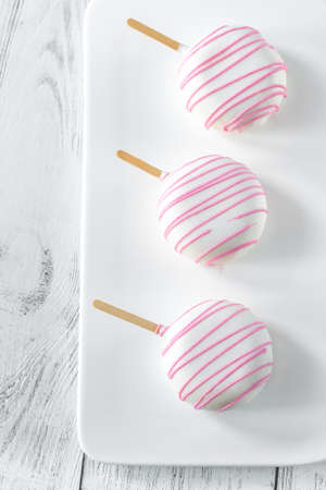 Cakes on the white plate: top viewの写真素材