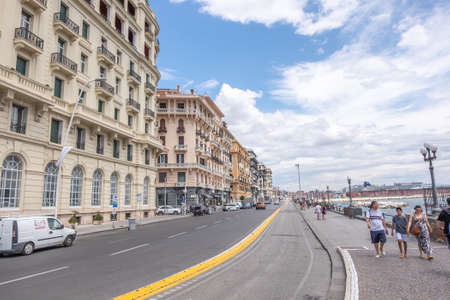NAPLES, ITALY - JULY 16, 2019: Via Nazario Sauro, packed with restaurants and hotels provide you with a beautiful view of the bay of Naples.の写真素材