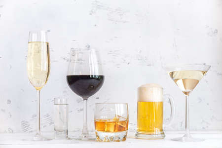Assortment of alcoholic drinks on whiteの写真素材
