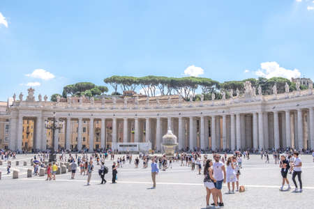 VATICAN CITY, VATICAN - JULY 14: St. Peter's Basilica and St. Peter's Square on July 14,2019. St. Peter's Square is a plaza located in front of St. Peter's Basilica.のeditorial素材