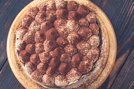 Tiramisu crepe cake on the wooden board