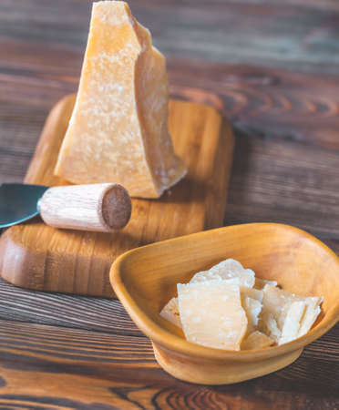 Parmesan cheese on the black stone board