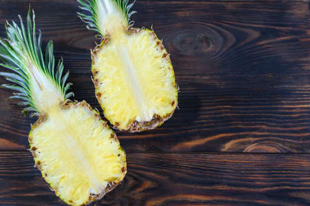 Pineapple on the table: cross sectionの写真素材