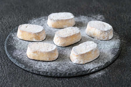 PolvorÃ³n - Spanish shortbread on dark stone board