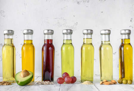 Assortment of vegetable oils in bottlesの写真素材