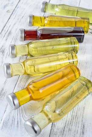 Assortment of vegetable oils in bottlesの写真素材