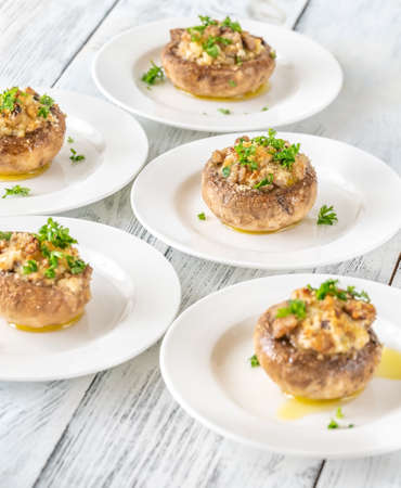 Stuffed mushroom caps with cream cheese, breadcrumbs and parmesanの写真素材