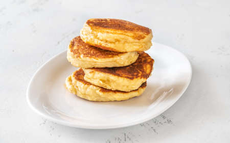 Stack of ricotta pancakes on the plate