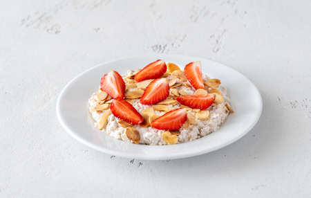Portion of homemade Bircher muesli with srawberryの写真素材