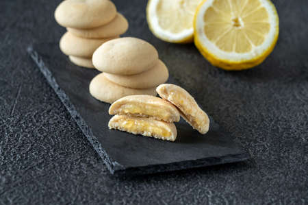 Lemon biscuits on stone board close upの写真素材