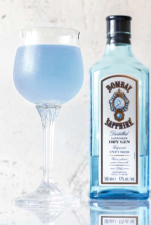 SUMY, UKRAINE - AUG 19, 2020:  Glass of Aviation cocktail made of Bombay Sapphire is a brand of gin, which name refers to the violet-blue Star of Bombay.のeditorial素材