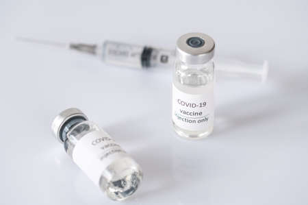 Two tubes of COVID-19 coronavirus vaccineの写真素材