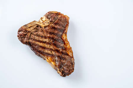Grilled T-bone steak flat lay isolated white backgroundの写真素材