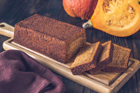 Loaf of pumpkin bread on the wooden boardの写真素材