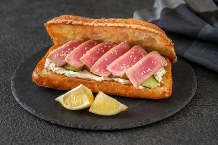 Sandwich with cream cheese, tuna and sesame seedsの写真素材
