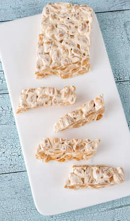 Pieces of turron European nougat confection with almondの写真素材