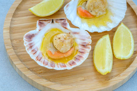King scallop with roe and butter sauce in shell