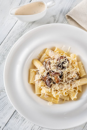 Tortiglioni pasta with porcini mushrooms and creamy sauceの写真素材