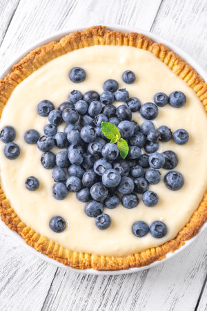 Pie with fresh blueberries and custard fillingの写真素材