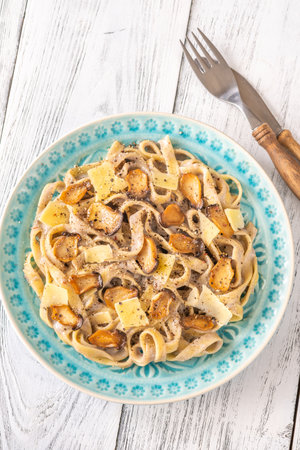 Portion of Creamy Tagliatelle pasta with Mushroomsの写真素材