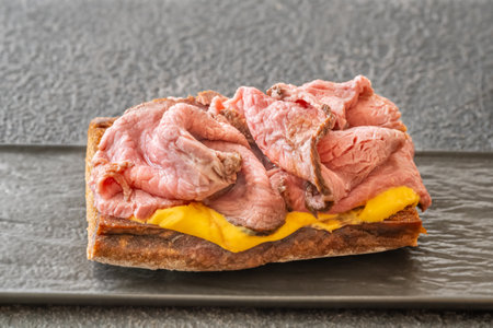 Sandwich with sliced roast beef and cheeseの写真素材