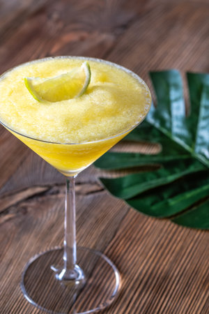 Frozen Banana Daiquiri with lime wedge garnishの写真素材
