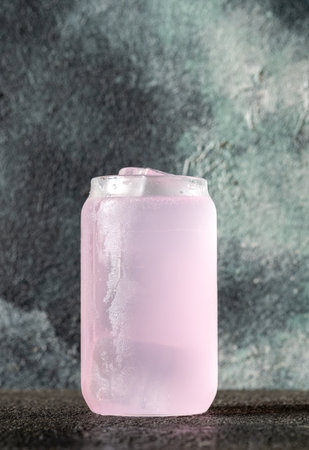 Glass of Lavender Gin on gray backgroundの写真素材