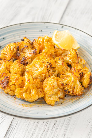 Bowl of Garlic parmesan roasted cauliflower floretsの写真素材