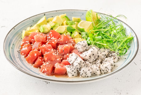 Portion of Hawaiian poke with tuna, pitaya and avocadoの写真素材