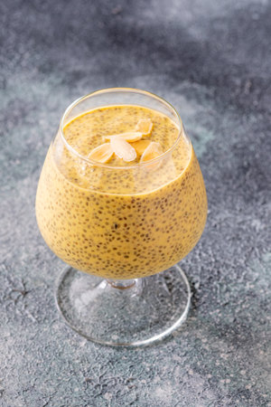 Chia pudding with mango pulp and almond milkの写真素材