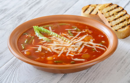 Portion of Minestrone soup made with vegetables and stockの写真素材