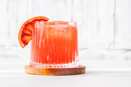Sanguinello Cocktail garnished with blood orange wheelの写真素材