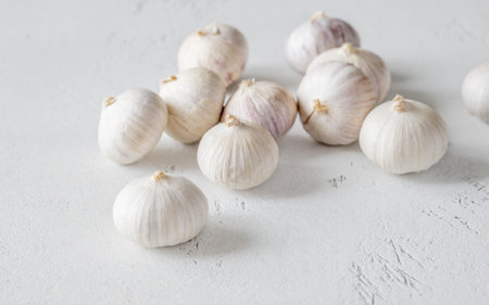 Bunch of solo garlic on the white backgroundの写真素材