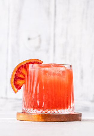 Sanguinello Cocktail garnished with blood orange wheelの写真素材