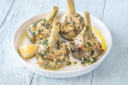 Classic Carciofi alla Romana with herbs, olive oil, and delicate flavorsの写真素材