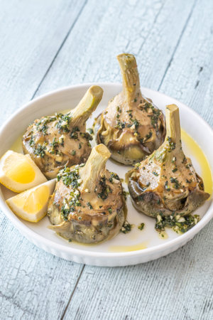 Classic Carciofi alla Romana with herbs, olive oil, and delicate flavorsの写真素材