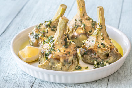 Classic Carciofi alla Romana with herbs, olive oil, and delicate flavorsの写真素材