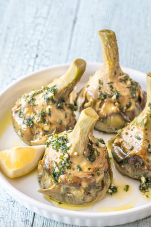 Classic Carciofi alla Romana with herbs, olive oil, and delicate flavorsの写真素材