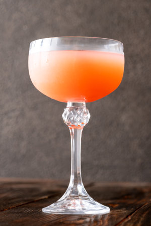 Coffee syrup and guava unite with rum, garnished by floating coffee beansの写真素材