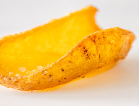 Golden dipper rests alone in focus, edges crisp and texture richly detailedの写真素材