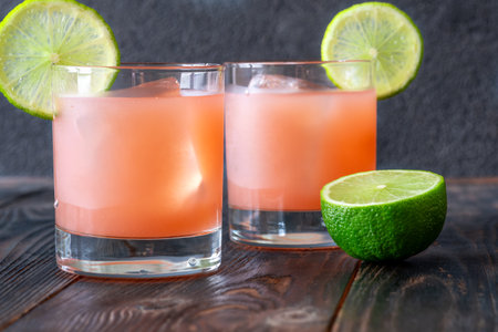 Guava, lime, and tequila blend in tropical harmony with citrus-laced eleganceの写真素材