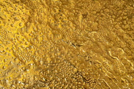 Abstract metallic gold backgroundの写真素材