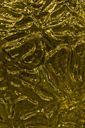 Uneven wavy glass surface, volumetric pattern, changed color, backgroundの写真素材