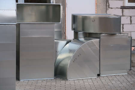 The metal elements of the ventilation system are purchased at the construction siteの写真素材