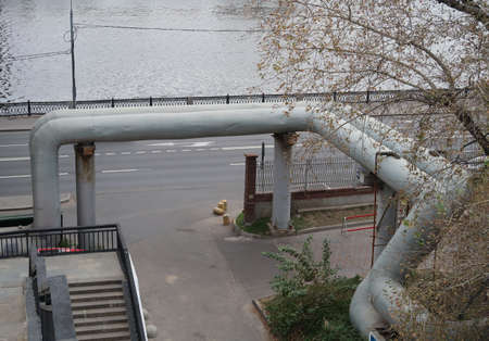 Powerful pipes for supplying heat from a heat station on the embankment, complex geometryの写真素材