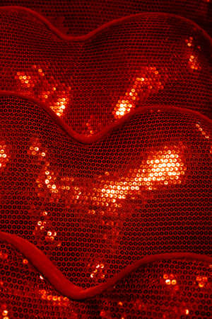 Christmas toys, red hearts backlit, festive backgroundの写真素材
