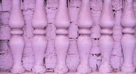 Old painted balusters on the balcony of a house, retro background, slightly changed colorの写真素材