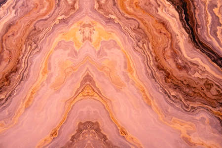 Smooth cut of artificial stone, wavy pattern, changed color, background