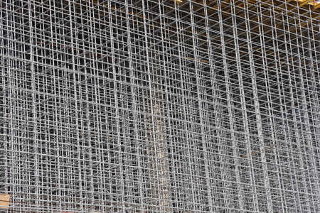 Volumetric multi tiered lattice for concreting during the construction of a sports facility, texture, backgroundの写真素材