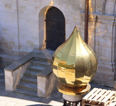 New gilded dome prepared for installation on the temple, repair and reconstruction of the temple,...